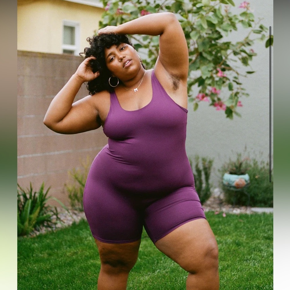 Girlfriend collective bike unitard in S/ Plum